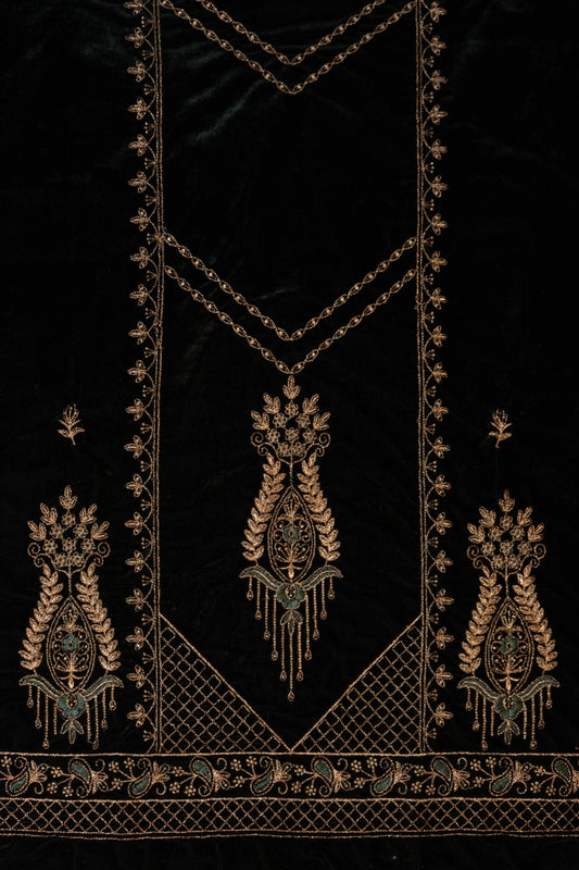 Decorative embroidered design on a black background