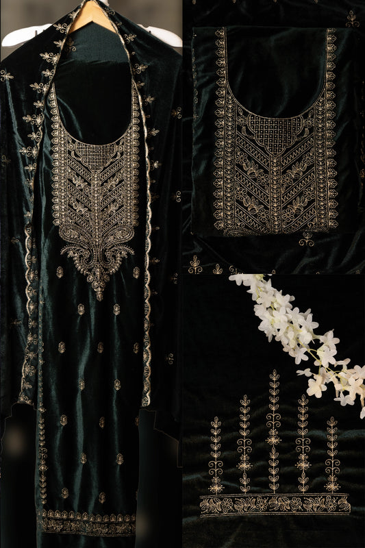 Black embroidered garment with intricate designs on a dark background