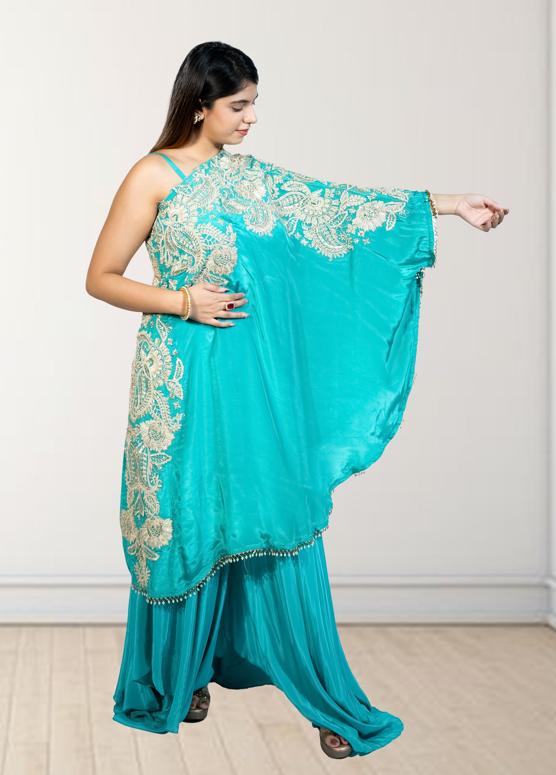 Rama Green Off-Shoulder Cape with Sharara & Breastiser | Pearl, Lace, Cut Dana & Sequence Work | Indo Western | Sizes L–XXL - Bebo N Lolo