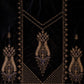 Decorative fabric with intricate gold embroidery on a black background