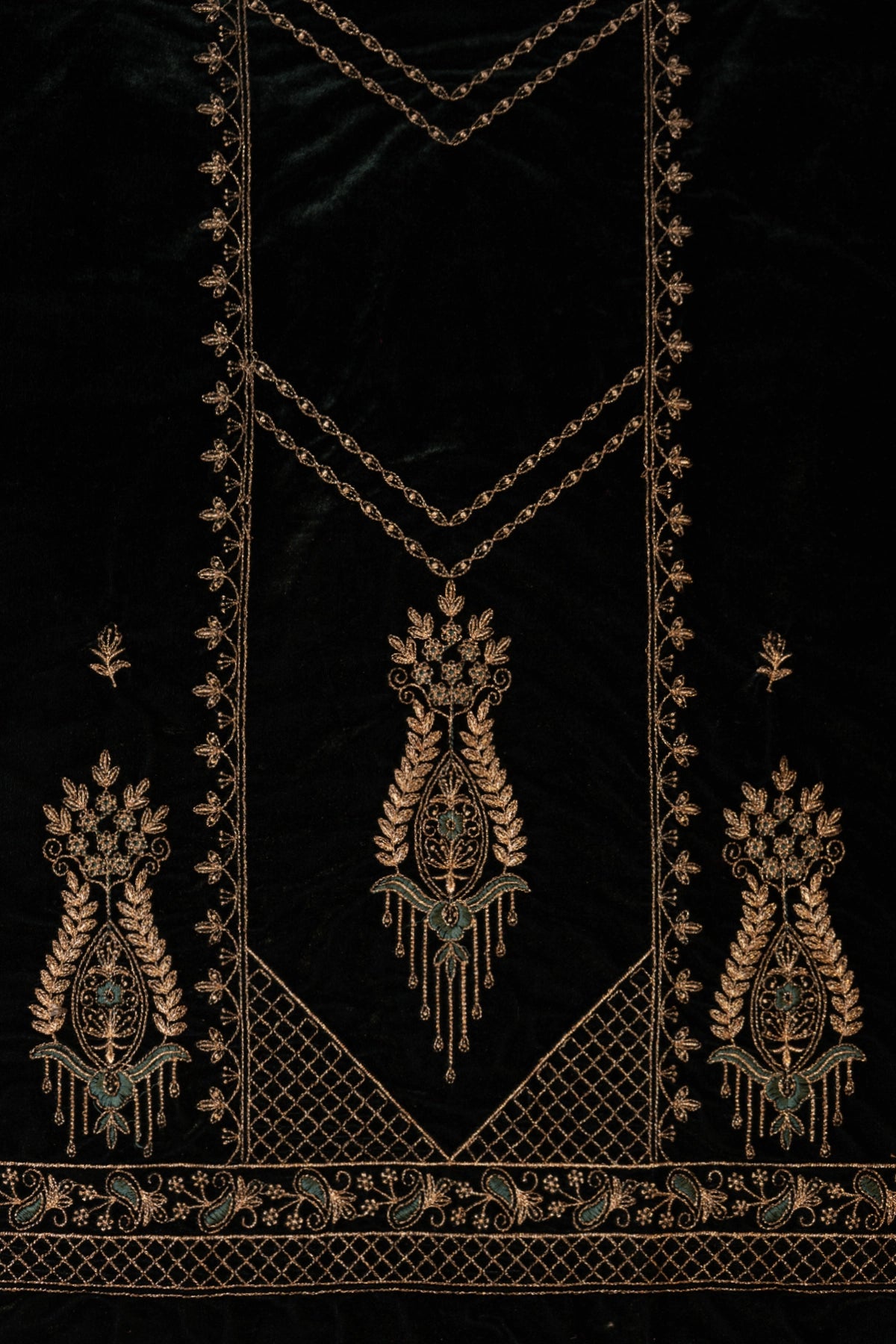 Decorative embroidered design on a black background