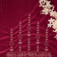 Decorative red fabric with white floral embroidery and a branch of white flowers on a matching red background.