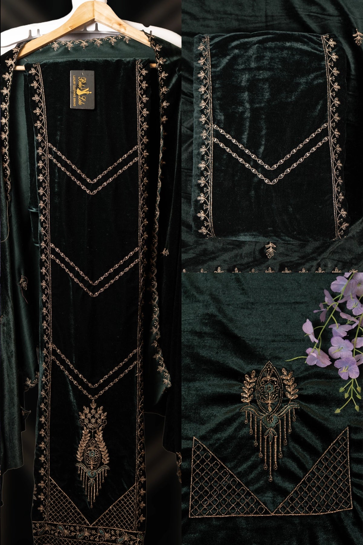 Dark green velvet garment with gold embroidery on a hanger against a black background.