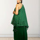 Woman wearing a green outfit with a white background