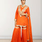 Orange traditional outfit with gold embroidery on a white background