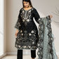 Woman wearing a black embroidered outfit with a matching dupatta in a neutral setting