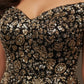 Close-up of a black sequin dress with gold floral patterns.